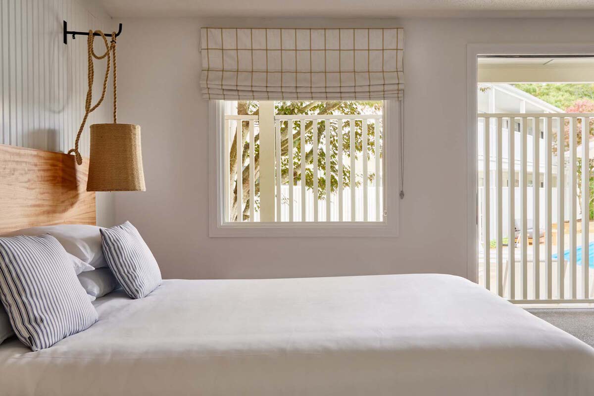ADA King room with a king bed beside a window